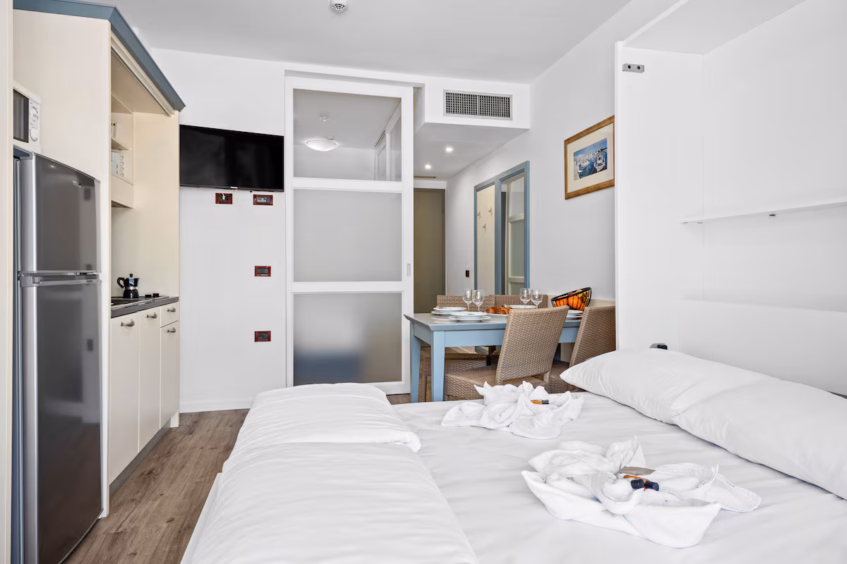 Family-Apartment-1-Bedroom-Balcon-Living-area-TV-ping-pong